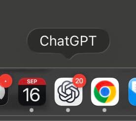 A macOS dock with a red 20 notification badge sitting on the ChatGPT icon